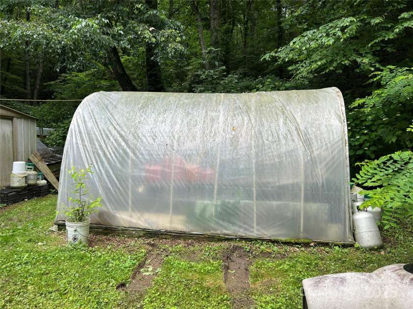 687 Willow Creek Road, Leicester, NC 28748.  MLS# CAR4269664, YatesRealty ID 18921. Greenhouse