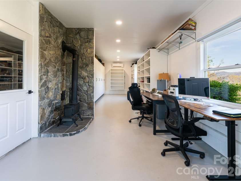83 Cozy Mountain Lane, Weaverville, NC 28787.  MLS# CAR4368940, YatesRealty ID 18921. Detached  garage/office