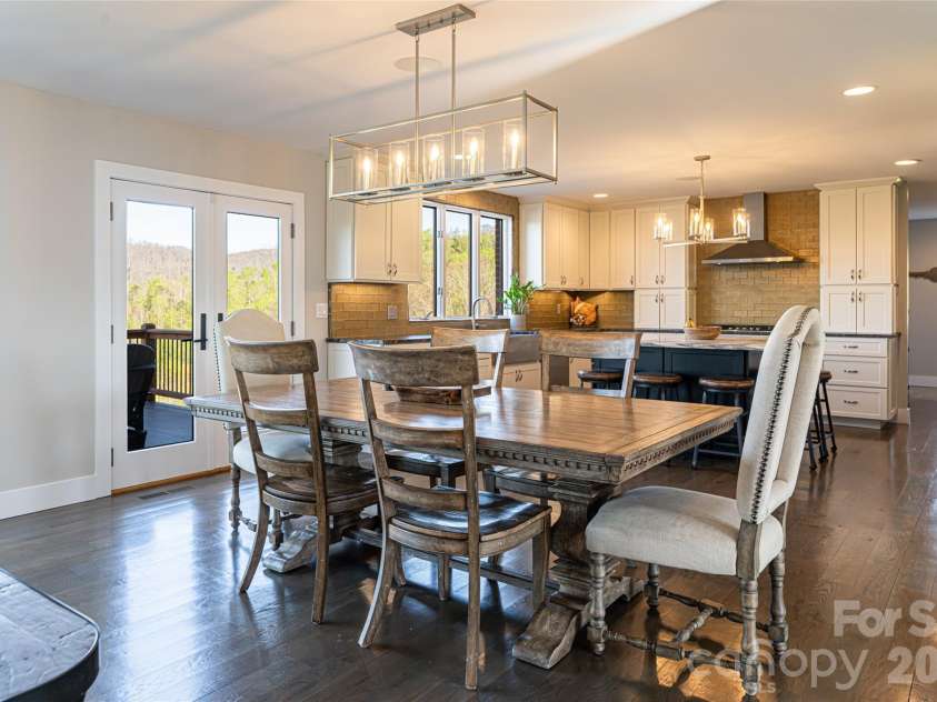 83 Cozy Mountain Lane, Weaverville, NC 28787.  MLS# CAR4368940, YatesRealty ID 18921. Dining looking towards kitchen