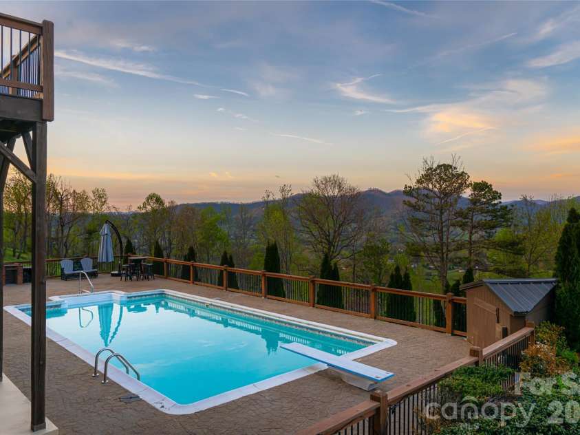 83 Cozy Mountain Lane, Weaverville, NC 28787.  MLS# CAR4368940, YatesRealty ID 18921. In-ground pool