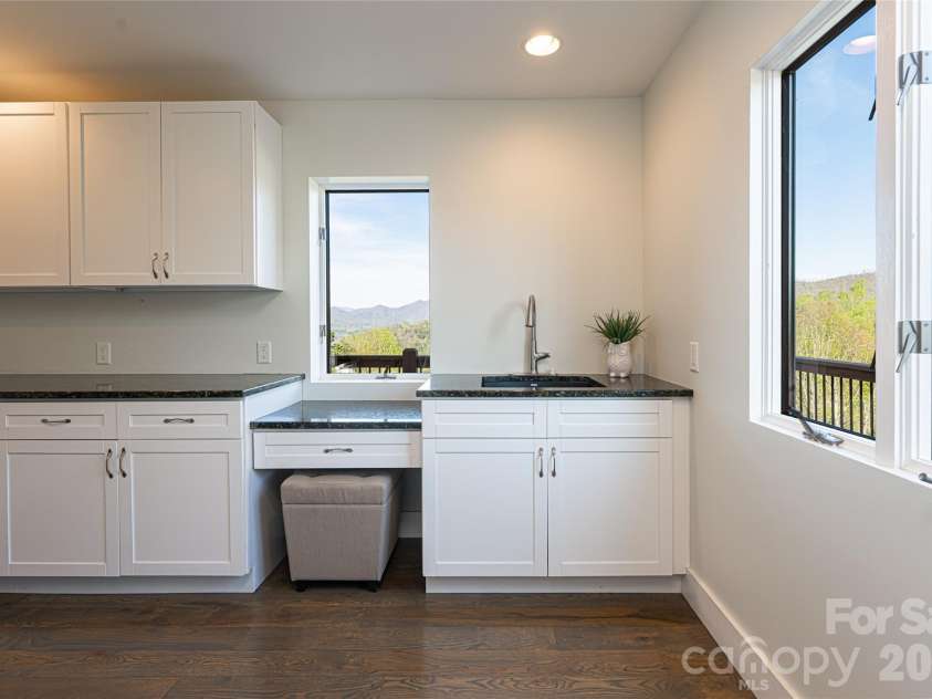 83 Cozy Mountain Lane, Weaverville, NC 28787.  MLS# CAR4368940, YatesRealty ID 18921. Laundry