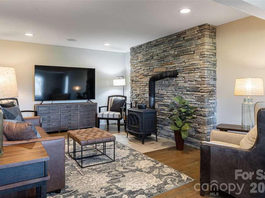 83 Cozy Mountain Lane, Weaverville, NC 28787.  MLS# CAR4368940, YatesRealty ID 18921. Lower level recreation room