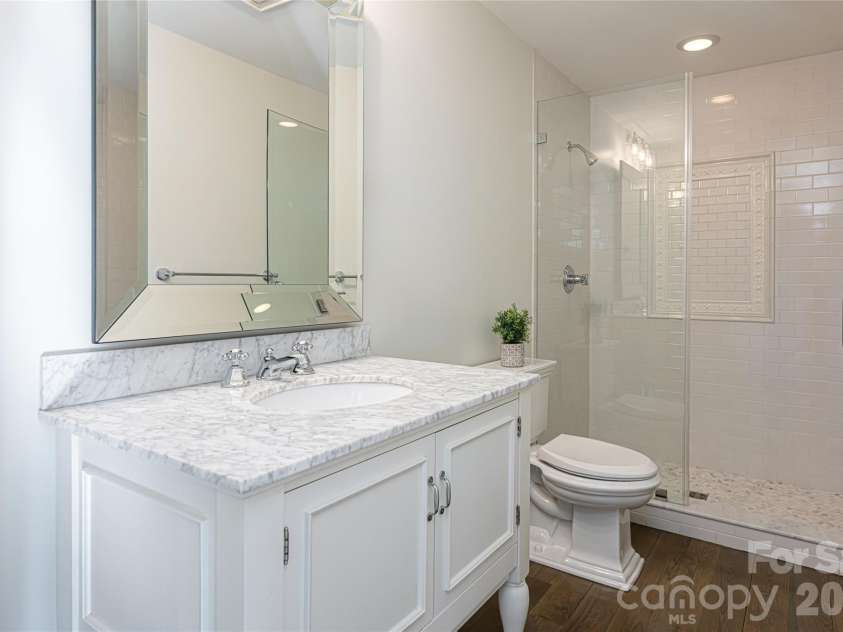 83 Cozy Mountain Lane, Weaverville, NC 28787.  MLS# CAR4368940, YatesRealty ID 18921. Main level full bathroom