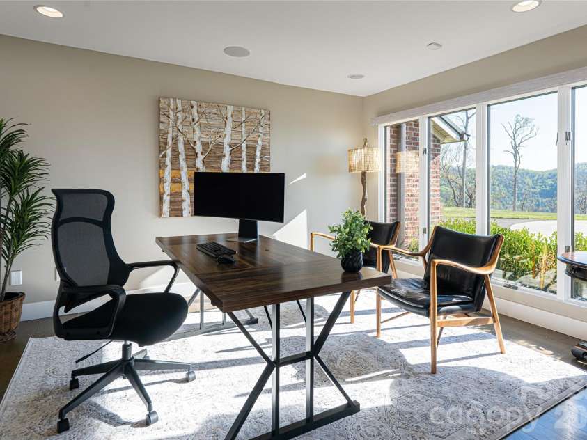 83 Cozy Mountain Lane, Weaverville, NC 28787.  MLS# CAR4368940, YatesRealty ID 18921. Main level office