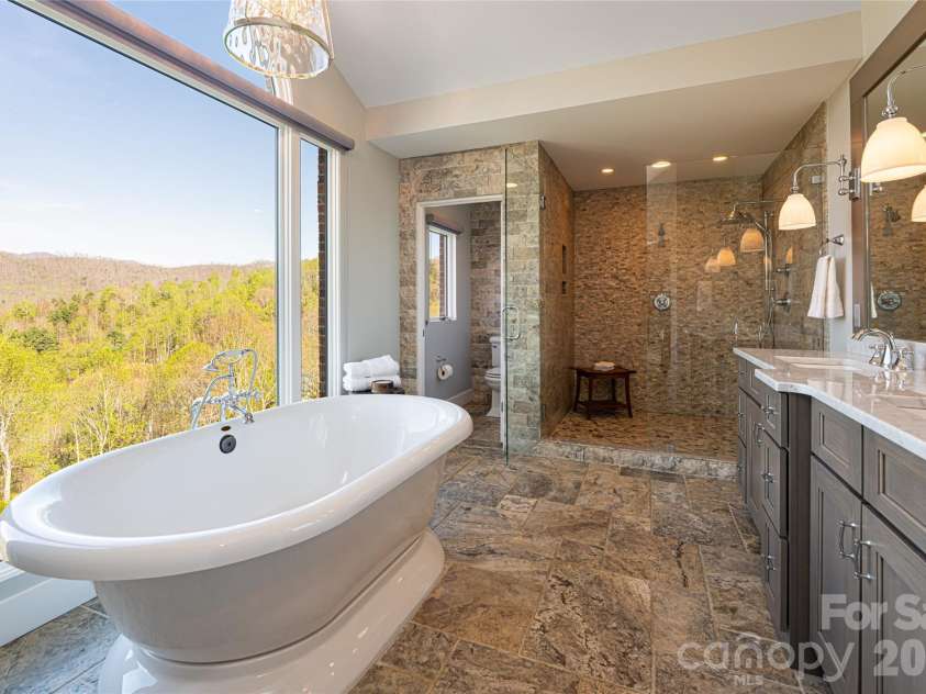 83 Cozy Mountain Lane, Weaverville, NC 28787.  MLS# CAR4368940, YatesRealty ID 18921. Primary ensuite