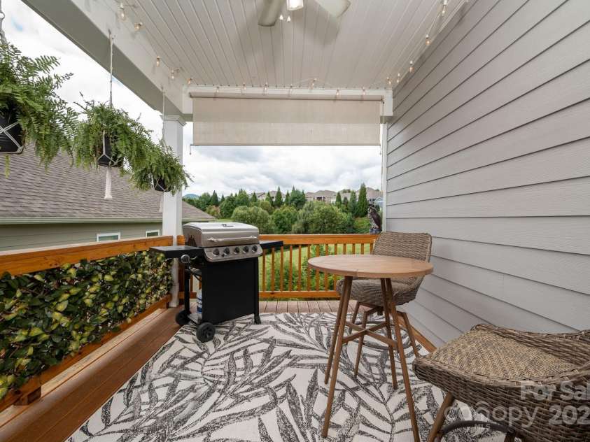 45 Dreambird Drive, Leicester, NC 28748.  MLS# CAR4266636, YatesRealty ID 18923. Covered Porch Retreat