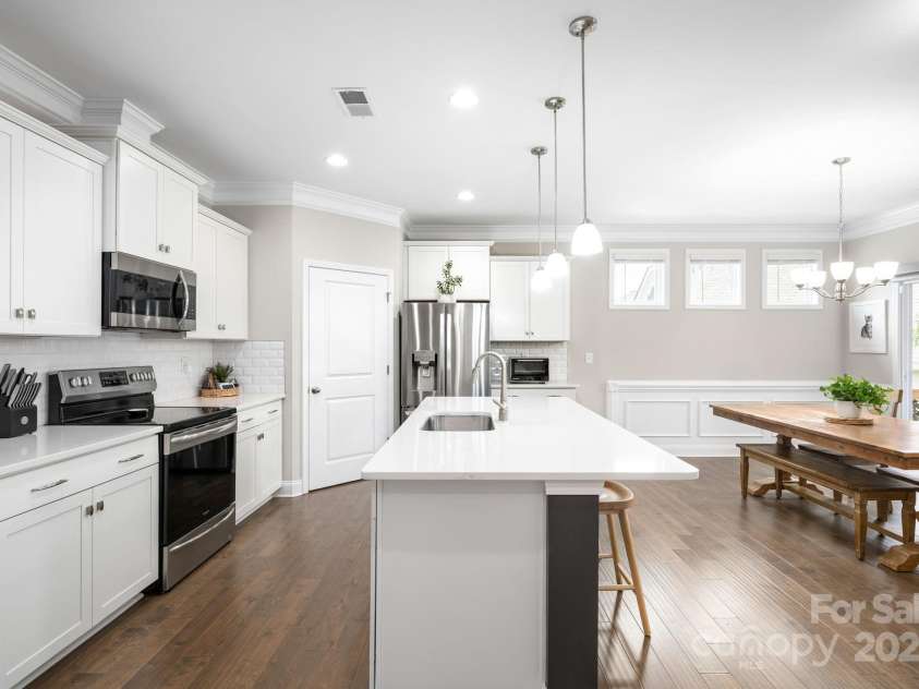 45 Dreambird Drive, Leicester, NC 28748.  MLS# CAR4266636, YatesRealty ID 18923. Kitchen Overlooks Living Area