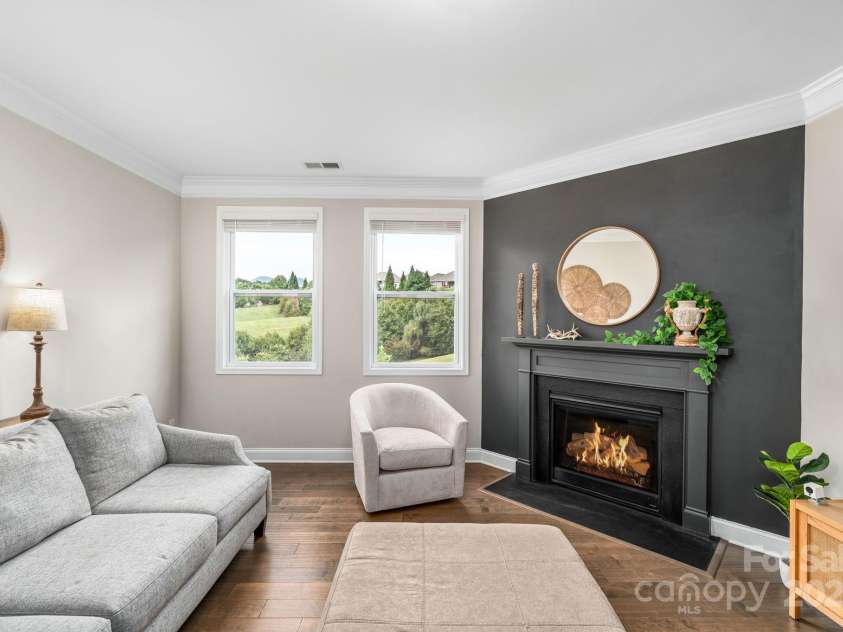 45 Dreambird Drive, Leicester, NC 28748.  MLS# CAR4266636, YatesRealty ID 18923. Living Room with Fireplace
