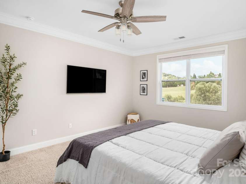 45 Dreambird Drive, Leicester, NC 28748.  MLS# CAR4266636, YatesRealty ID 18923. Primary Bedroom with Mountain Views