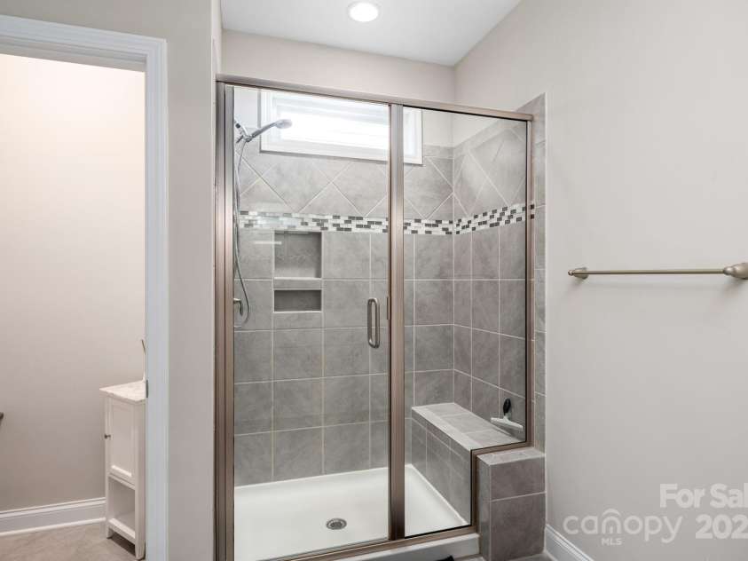 45 Dreambird Drive, Leicester, NC 28748.  MLS# CAR4266636, YatesRealty ID 18923. Tiled Walk-In Shower