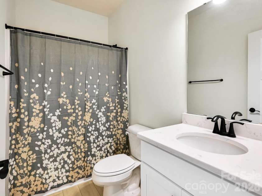 21 Christie Court, Fletcher, NC 28732.  MLS# CAR4371496, YatesRealty ID 18924. Main floor full bathroom.