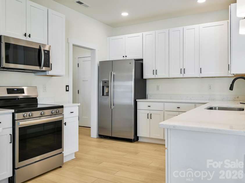21 Christie Court, Fletcher, NC 28732.  MLS# CAR4371496, YatesRealty ID 18924. Stainless appliances.