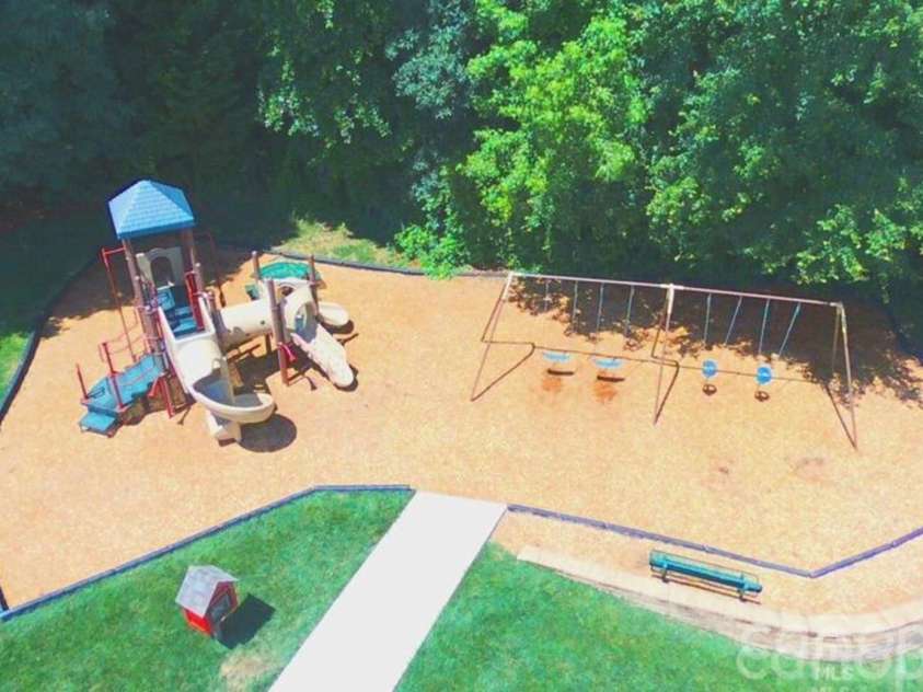 5006 Shannamara Drive, Matthews, NC 28104.  MLS# CAR4338291, YatesRealty ID 18925. Community Kid's playground