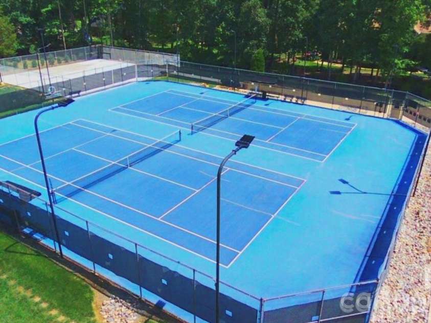 5006 Shannamara Drive, Matthews, NC 28104.  MLS# CAR4338291, YatesRealty ID 18925. Community Tennis Courts