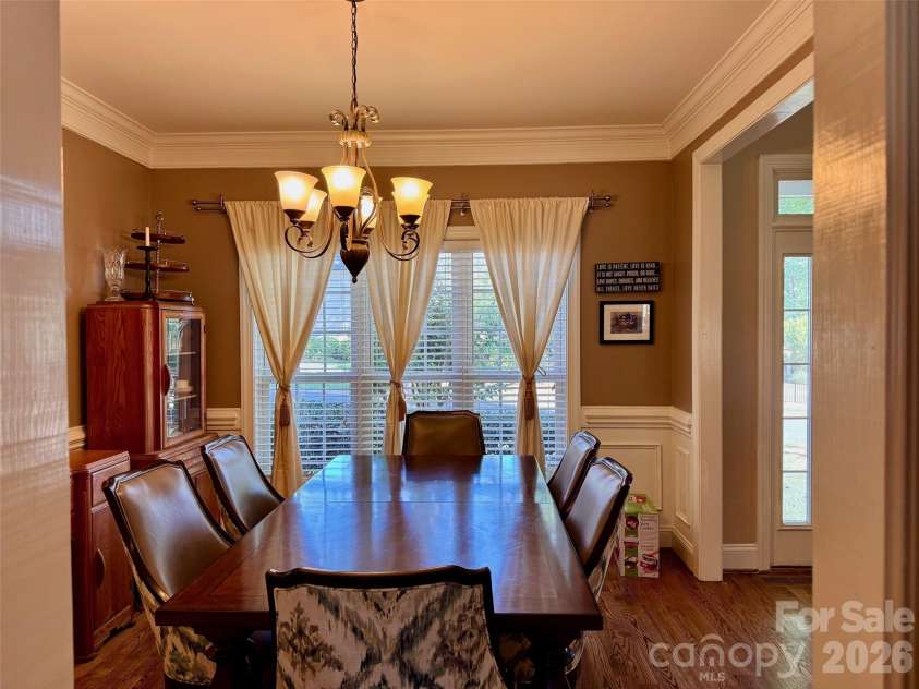 5006 Shannamara Drive, Matthews, NC 28104.  MLS# CAR4338291, YatesRealty ID 18925. DR 2 comfortably seats 6-8 persons