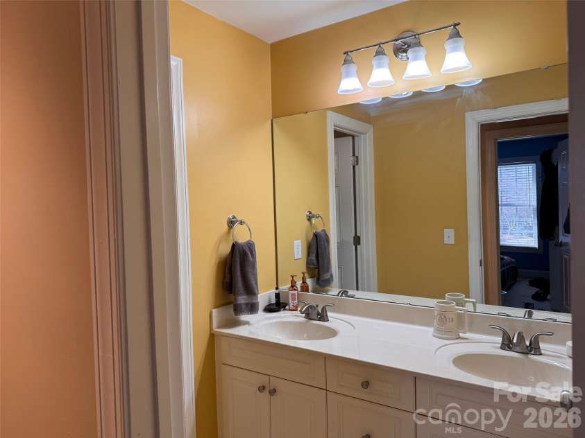 5006 Shannamara Drive, Matthews, NC 28104.  MLS# CAR4338291, YatesRealty ID 18925. Dual vanity BA 3 Nickel hardware