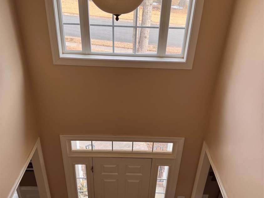 5006 Shannamara Drive, Matthews, NC 28104.  MLS# CAR4338291, YatesRealty ID 18925. Two-story foyer
