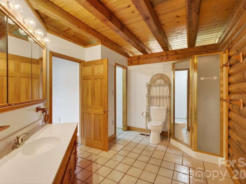 5981 Johnson Road, Clover, SC 29710.  MLS# CAR4358157, YatesRealty ID 18926. Primary bathroom with tile floors - shower - 2 walk-in closets