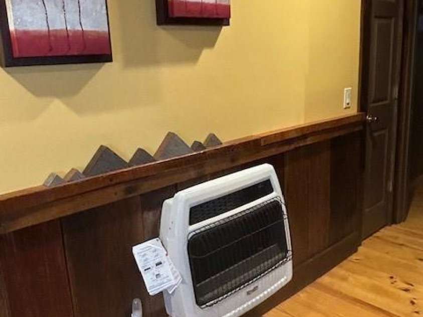 116 Minerva Lane, Sapphire, NC 28774.  MLS# CAR4237813, YatesRealty ID 1893. Propane wall heater in hallway