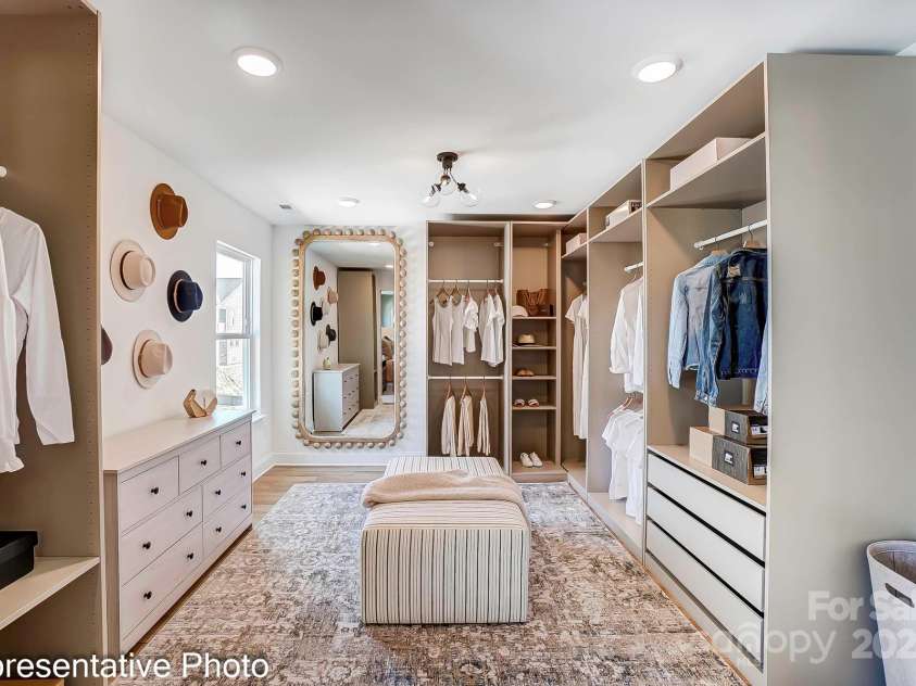 132 Longwood Road, Mooresville, NC 28115.  MLS# CAR4239532, YatesRealty ID 18934. This home features a primary sitting room attached to the primary bedroom