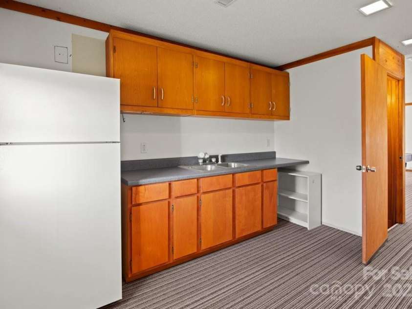 153 River Lane, Dobson, NC 27017.  MLS# CAR4233165, YatesRealty ID 1894. Living quarters second level