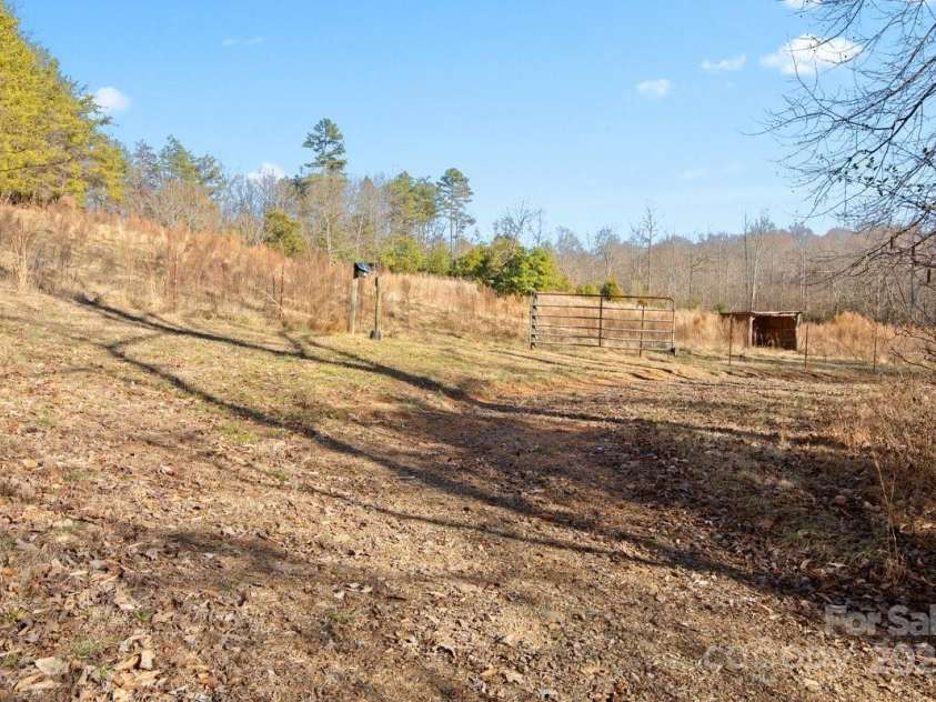 153 River Lane, Dobson, NC 27017.  MLS# CAR4233165, YatesRealty ID 1894. Pasture run in