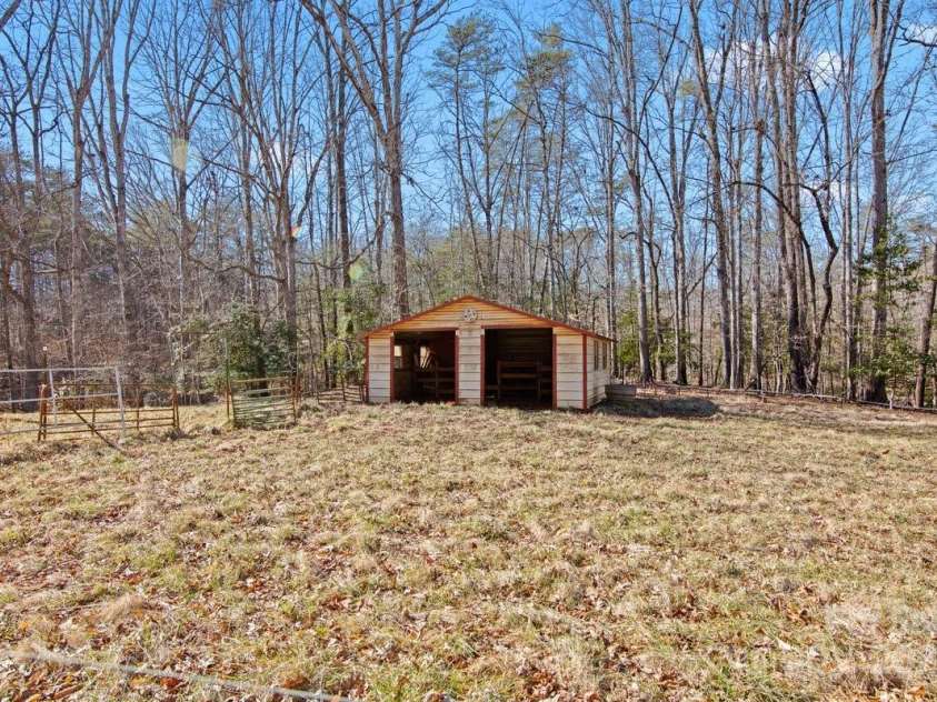 153 River Lane, Dobson, NC 27017.  MLS# CAR4233165, YatesRealty ID 1894. Pasture run in