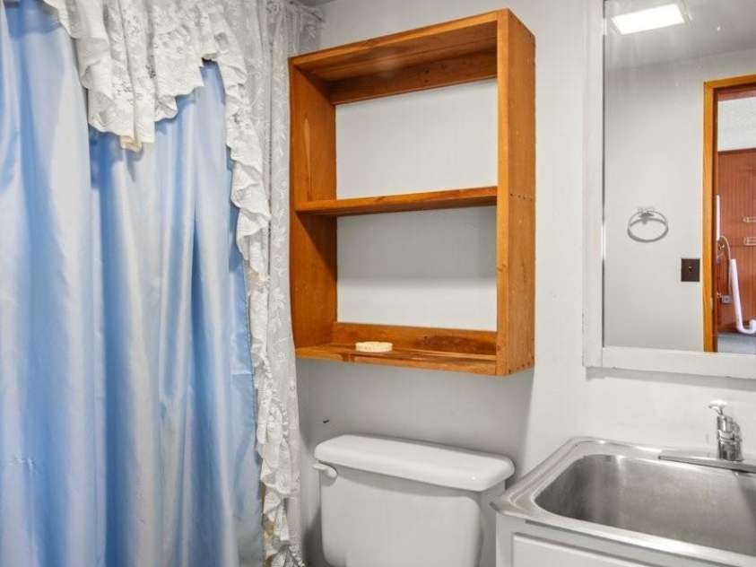 153 River Lane, Dobson, NC 27017.  MLS# CAR4233165, YatesRealty ID 1894. Shop 1/2 bath