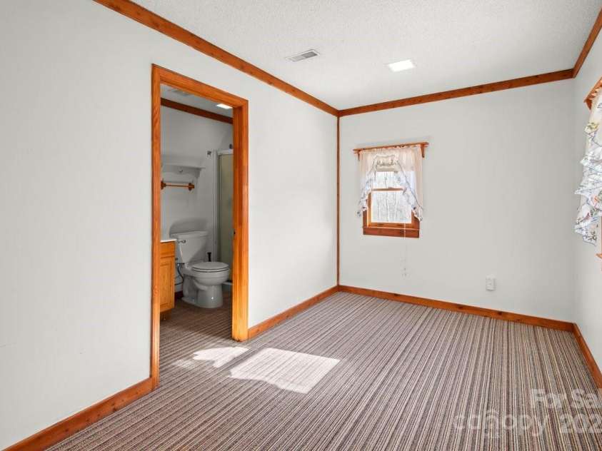 153 River Lane, Dobson, NC 27017.  MLS# CAR4233165, YatesRealty ID 1894. Shop living quarters