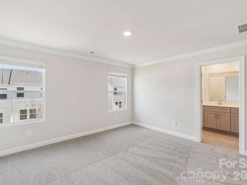 8116 Hidden Springs Trail, Charlotte, NC 28216.  MLS# CAR4347142, YatesRealty ID 18942. Photo is not of the actual home, but is an inspirational photo of builder’s model home and may depict options, furnishings, and/or decorator features that are not included