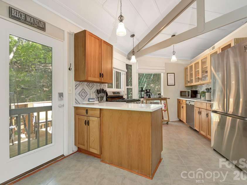 125 Pond Creek Road, Beech Mountain, NC 28604.  MLS# CAR4376008, YatesRealty ID 18951. 
