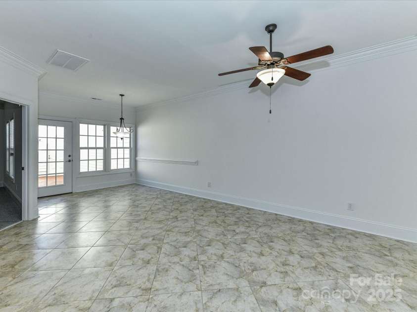 155 Harper Lee Street, Davidson, NC 28036.  MLS# CAR4328316, YatesRealty ID 18953. Breakfast Area overlooks the private back patio