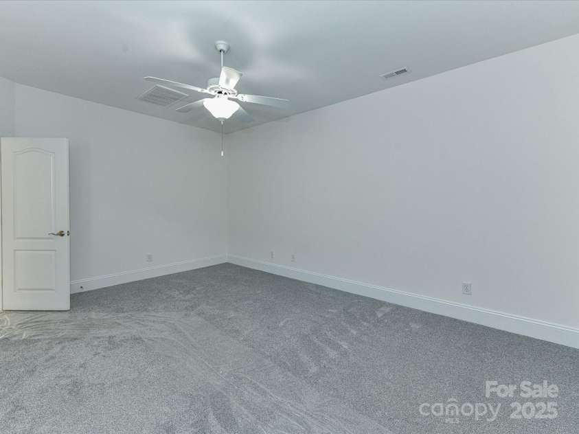 155 Harper Lee Street, Davidson, NC 28036.  MLS# CAR4328316, YatesRealty ID 18953. Very spacious Primary Bedroom