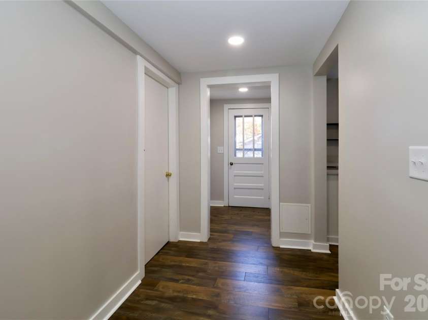 313 Dingler Avenue, Mooresville, NC 28115.  MLS# CAR4317035, YatesRealty ID 18955. Hall looking into Back Door