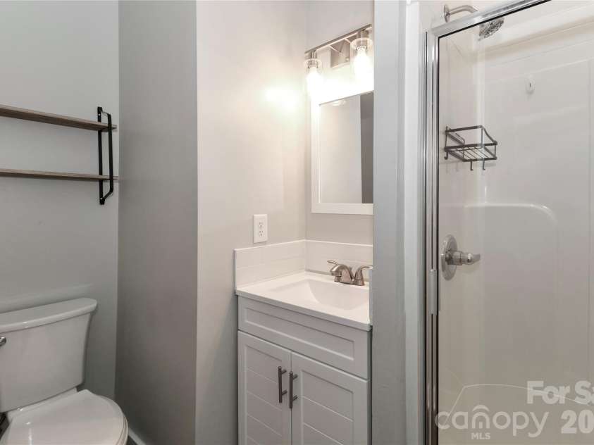 313 Dingler Avenue, Mooresville, NC 28115.  MLS# CAR4317035, YatesRealty ID 18955. Primary Bathroom