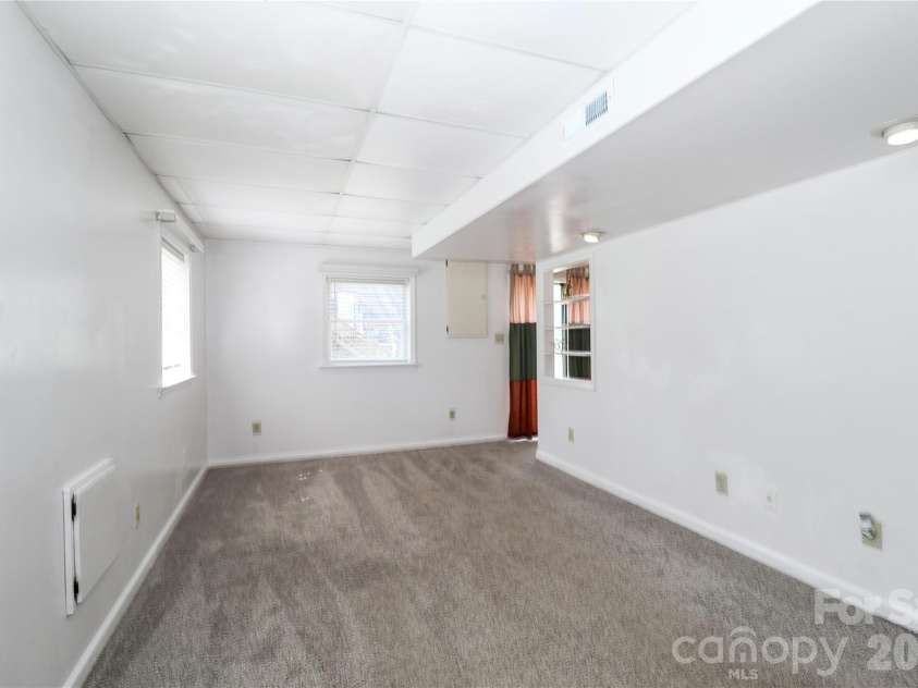 753 Stoney Lane, Statesville, NC 28625.  MLS# CAR4358635, YatesRealty ID 18956. Rec room on lower level