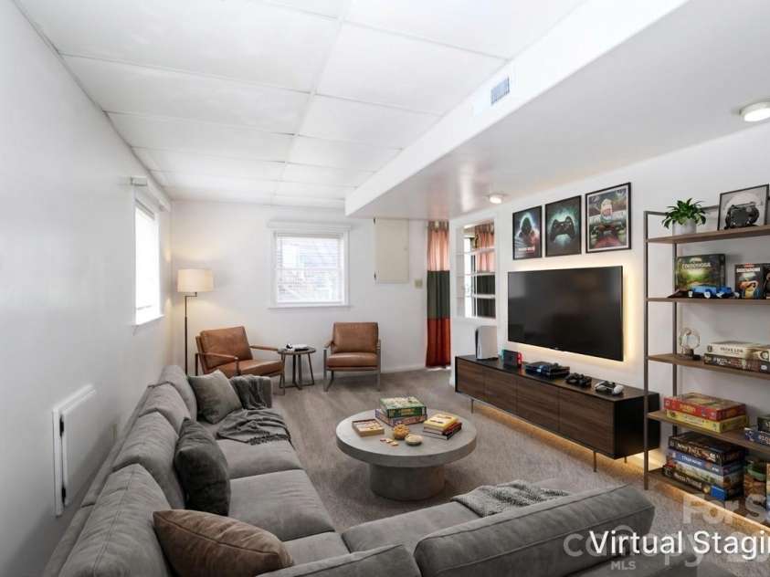 753 Stoney Lane, Statesville, NC 28625.  MLS# CAR4358635, YatesRealty ID 18956. Virtually staged rec room on lower level
