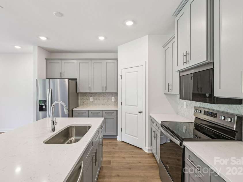 165 Murphy Meadow Road, Mocksville, NC 27028.  MLS# CAR4298472, YatesRealty ID 18958. Photo is not of the actual home, but is an inspirational photo of builder’s model home and may depict options, furnishings, and/or decorator features that are not included