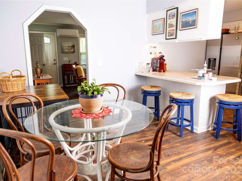 57 Gribble Road, Franklin, NC 28734.  MLS# CAR4253647, YatesRealty ID 18958. Archway from Kitchen to Living Room