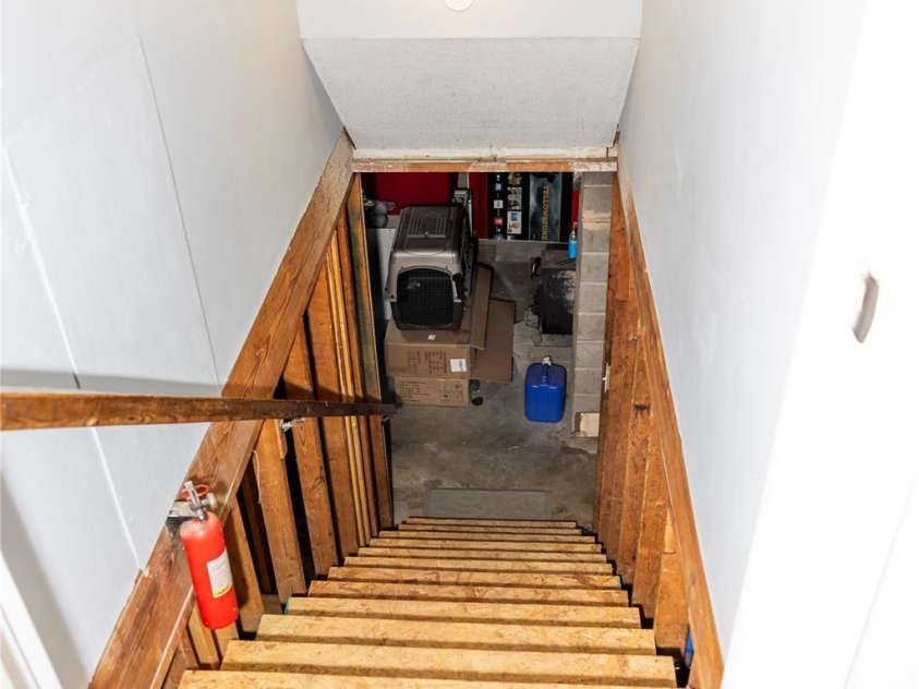 57 Gribble Road, Franklin, NC 28734.  MLS# CAR4253647, YatesRealty ID 18958. Basement steps from Kitchen