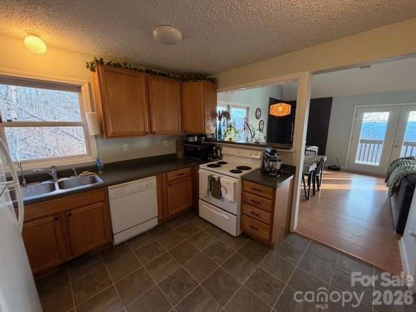 2329 Pinnacle Parkway, Union Mills, NC 28167.  MLS# CAR4250826, YatesRealty ID 18962. Looking from Kitchen thru to the Dining Room both having Views!