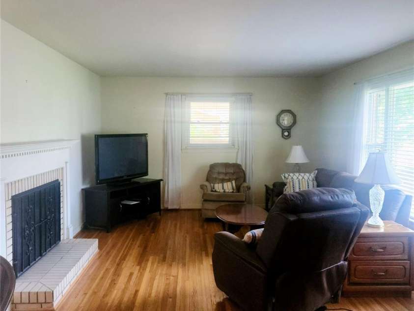 536 Catalina Drive, Albemarle, NC 28001.  MLS# CAR4260815, YatesRealty ID 18963. 2nd view of living room.  Beautiful hardwood floors.