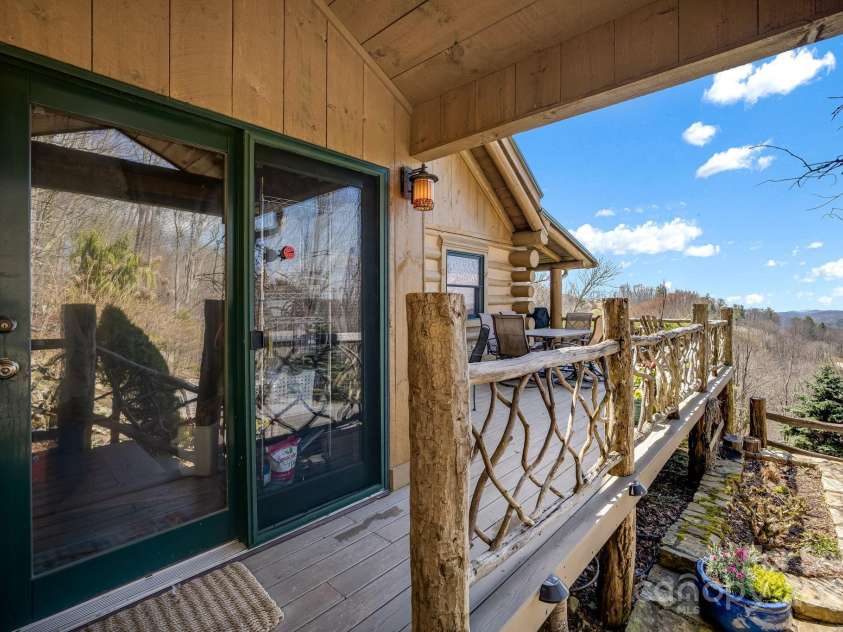 1873 El Miner Drive, Mars Hill, NC 28754.  MLS# CAR4251869, YatesRealty ID 18968. Covered entrance to the mudroom – the perfect place to drop your gear and step into comfort.