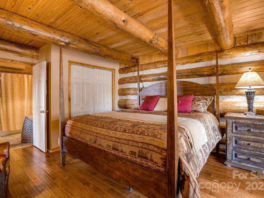 1873 El Miner Drive, Mars Hill, NC 28754.  MLS# CAR4251869, YatesRealty ID 18968. Private bath entrance from the main-level primary bedroom for ultimate convenience