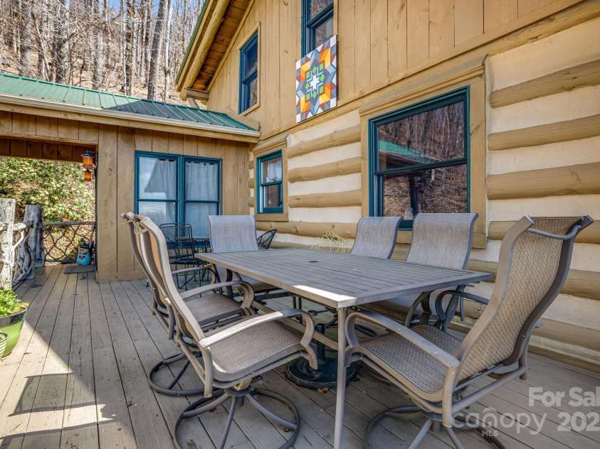 1873 El Miner Drive, Mars Hill, NC 28754.  MLS# CAR4251869, YatesRealty ID 18968. Sun deck with outdoor dining.