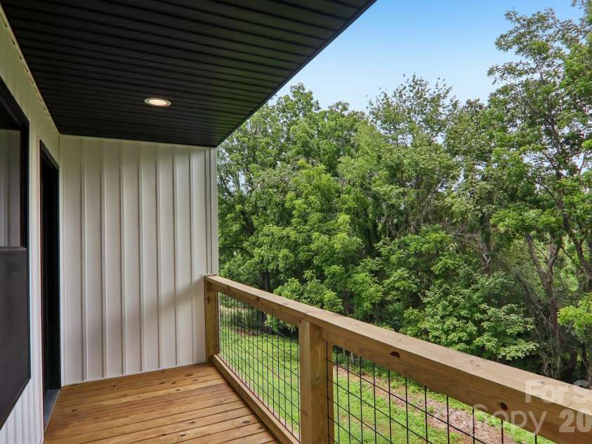 124 Main Street, Mars Hill, NC 28754.  MLS# CAR4375726, YatesRealty ID 18973. Covered back deck