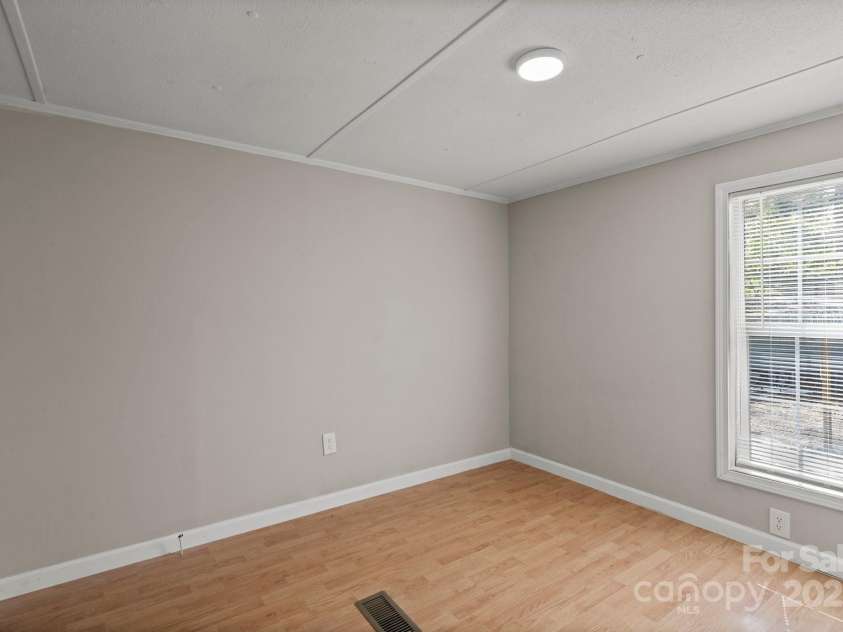 170 Dusty Loop Drive, Mount Gilead, NC 27306.  MLS# CAR4244157, YatesRealty ID 18973. Third Bedroom
