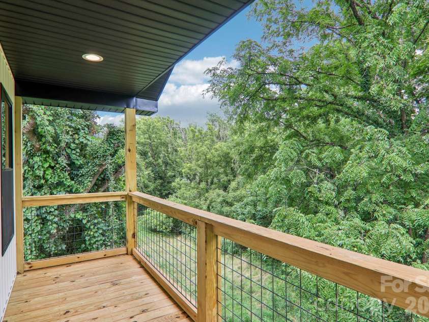 140 Main Street, Mars Hill, NC 28754.  MLS# CAR4375742, YatesRealty ID 18974. Covered back deck for sunrise's & morning coffee.