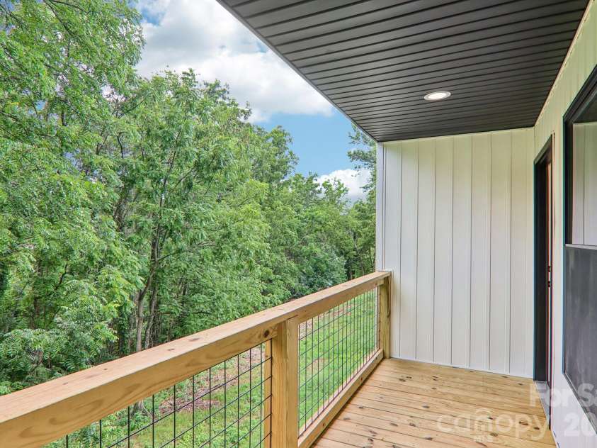 140 Main Street, Mars Hill, NC 28754.  MLS# CAR4375742, YatesRealty ID 18974. Covered back deck for sunrise's & morning coffee.