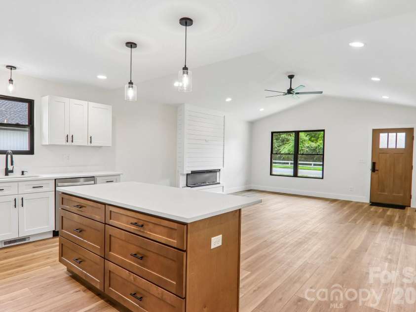 140 Main Street, Mars Hill, NC 28754.  MLS# CAR4375742, YatesRealty ID 18974. Kitchen island with seating and custom drawer base cabinet with soft close.